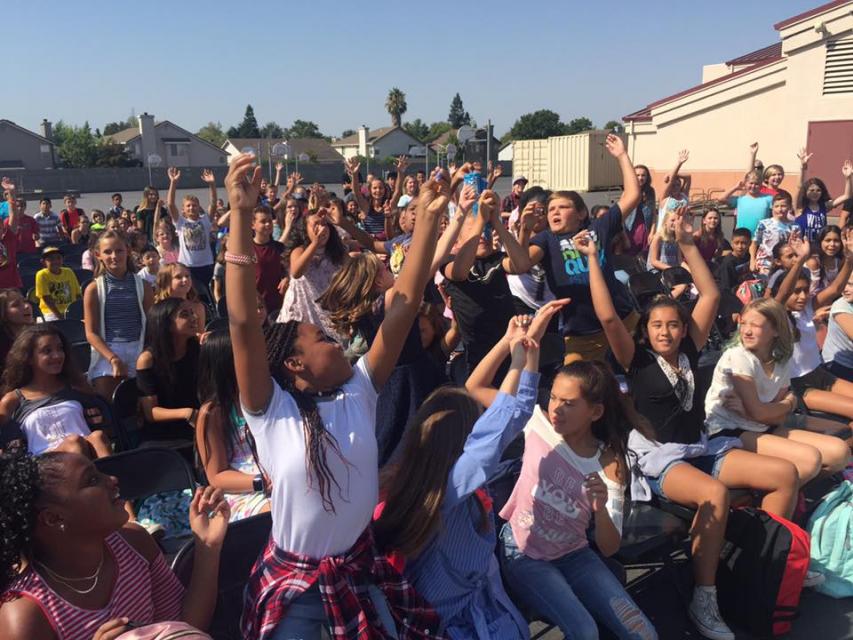 Students cheering in the quad.